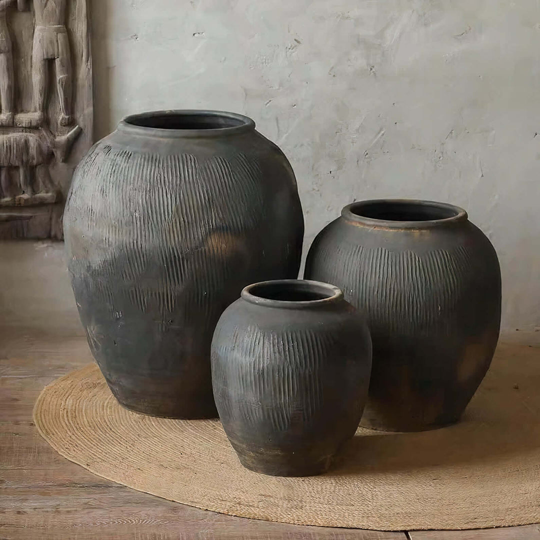 Ceramic Large Planter Pots - Large Indoor Plant Pots, artistic dark ceramic pots in varying sizes on natural rug.