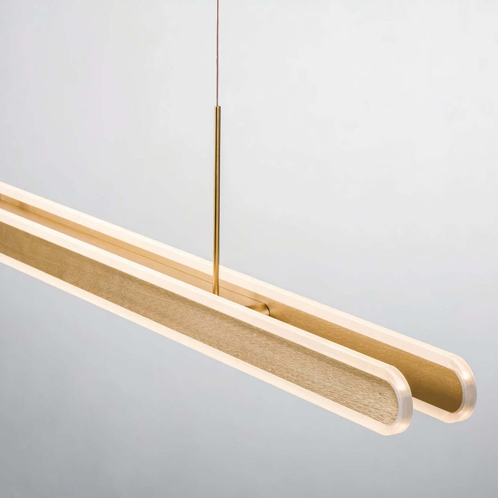 Linear Chandelier - Gold Chandelier featuring two elongated panels illuminating an elegant space.