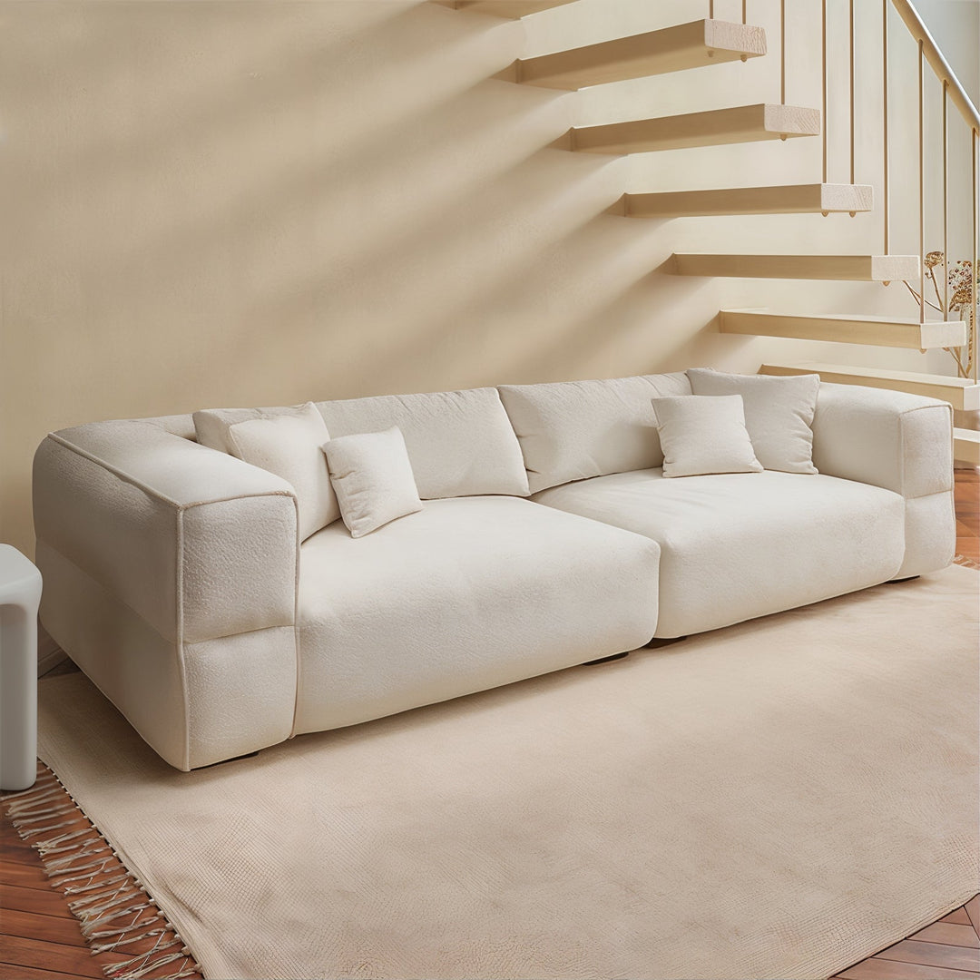 Living Room Sofa Set - Fabric Sofa in creamy ivory bouclé with oversized proportions and plush cushions.
