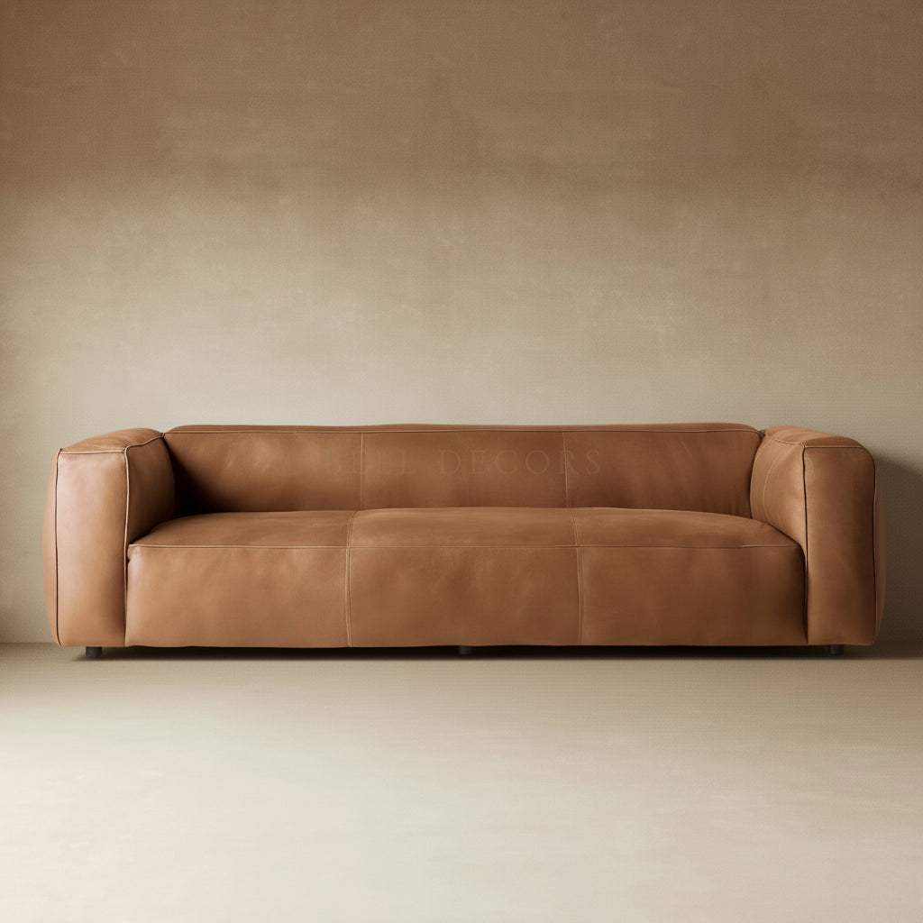Living Room Sofa Set - Leather Sofa Set in cognac leather with low-slung silhouette and rounded arms.