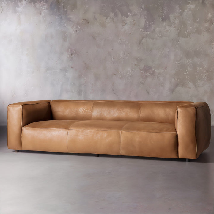 Living Room Sofa Set - Leather Sofa Set in premium cognac leather with low-slung silhouette and rounded arms.
