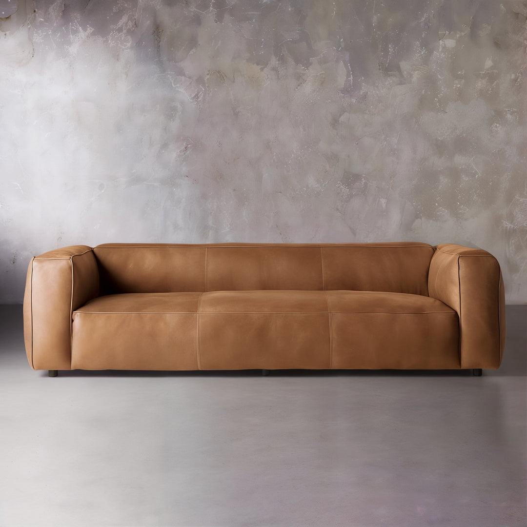 Living Room Sofa Set - Leather Sofa Set in premium full-grain cognac leather with rounded arms and low-slung silhouette.