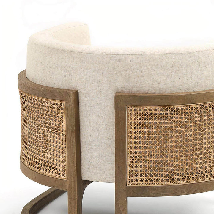 Lounge Chair - Comfortable Reading Chair with durable rattan and off-white linen upholstery.