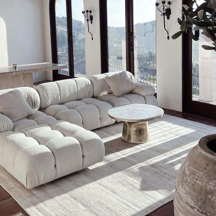 Fabric Sofa - Living Room Sofa Set in a modern living area with plush cushions and warm sunlight.