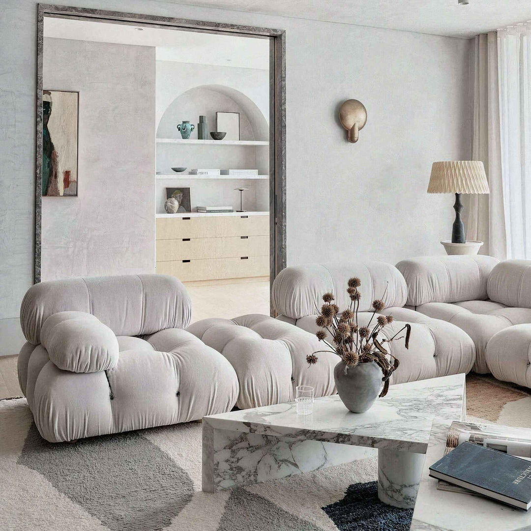 Fabric Sofa - Living Room Sofa Set in a modern Scandinavian style living room with plush cushions and marble table.