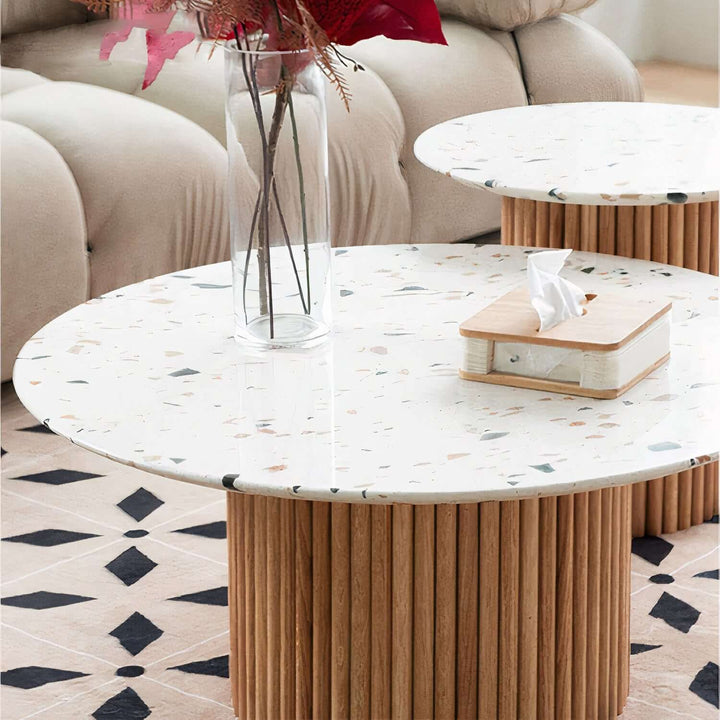 Marble Coffee Table - Coffee Table In Marble showcasing a speckled marble top and architecturally inspired base.