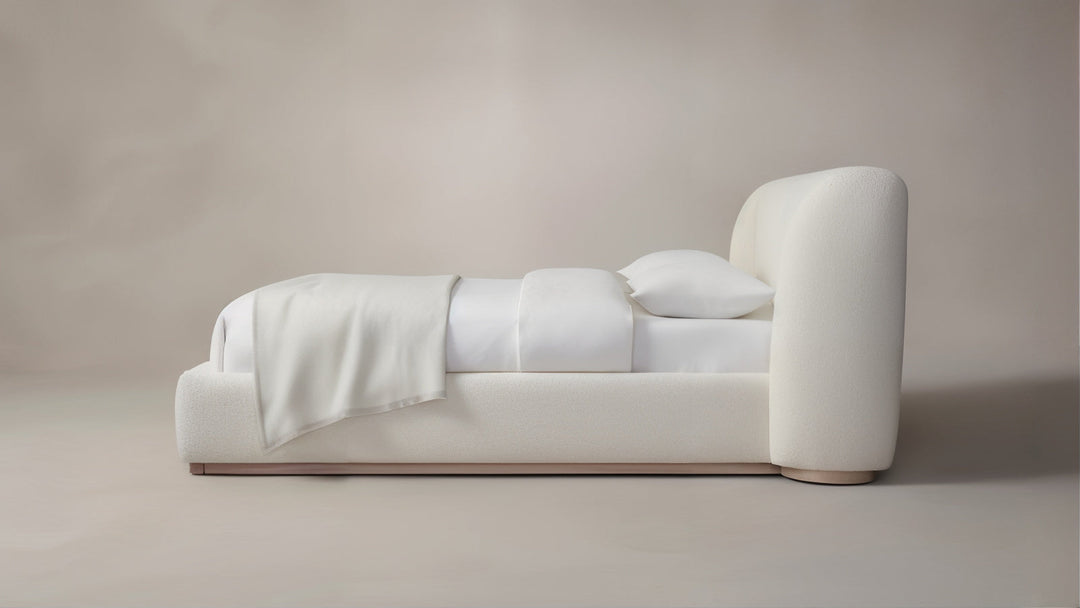 California King Bed - Queen Size Bed with luxurious bouclé upholstery and modern design.