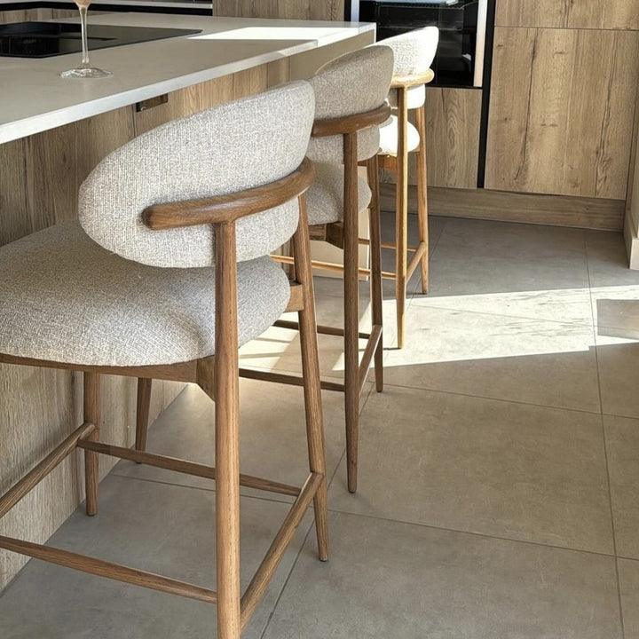 Modern Bar Stools - Wooden Bar Stools in a stylish kitchen setting with a sleek design and wooden frames.