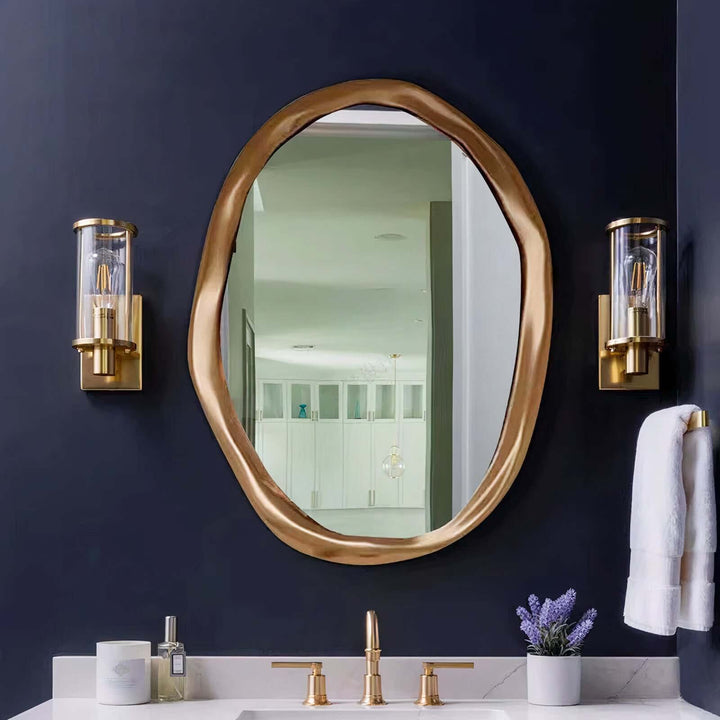 Gold Mirror - Circle Mirror showcasing its unique design in a stylish bathroom setting.