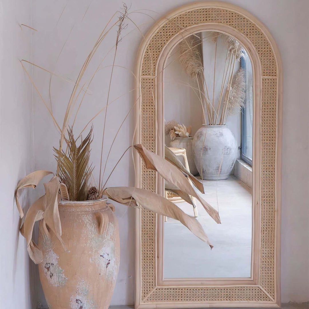 Arched Mirror - Full Length Mirror showcasing an elegant curved design and reflection in a stylish interior with decorative accents.