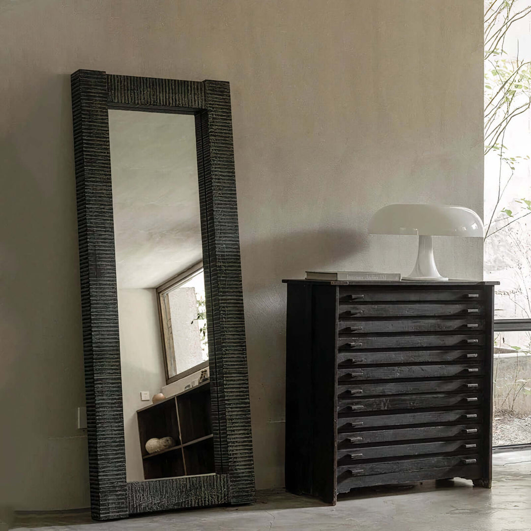 Vanity Mirror - Floor Mirror in rustic design beside a sleek bedroom dresser and contemporary lamp.