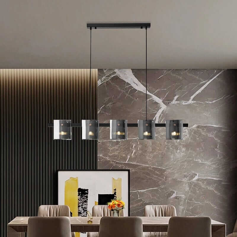 Stylish LED chandelier hanging over a modern dining table, illuminating the room with a warm and inviting glow.