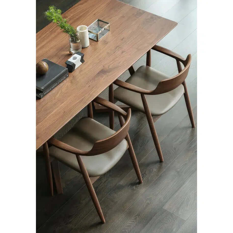 Solid Wood Dining Chair - Dining Room Chair beside a wooden dining table with decorative items on it.