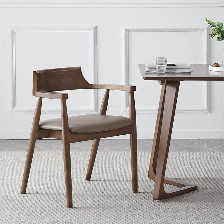 Solid Wood Dining Chair - Dining Room Chair in a stylish, modern dining setting with a beige leather seat.