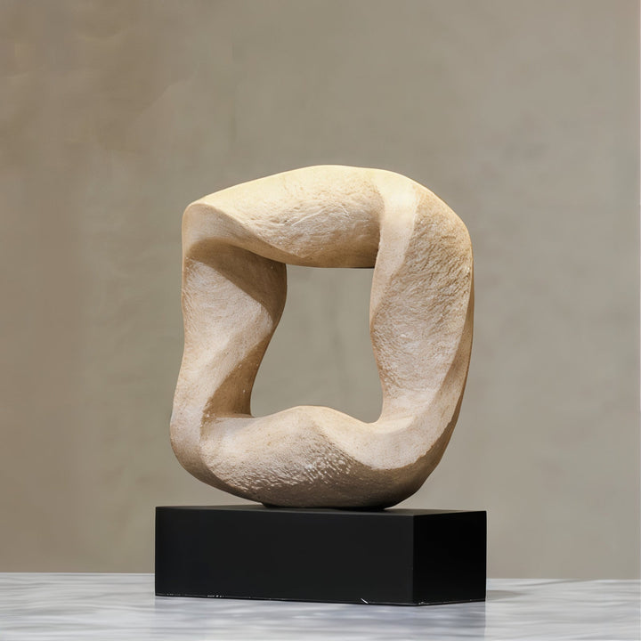 Abstract Sculpture - Ceramic Sculpture showcasing a fluid, knotted design on a sleek black base.