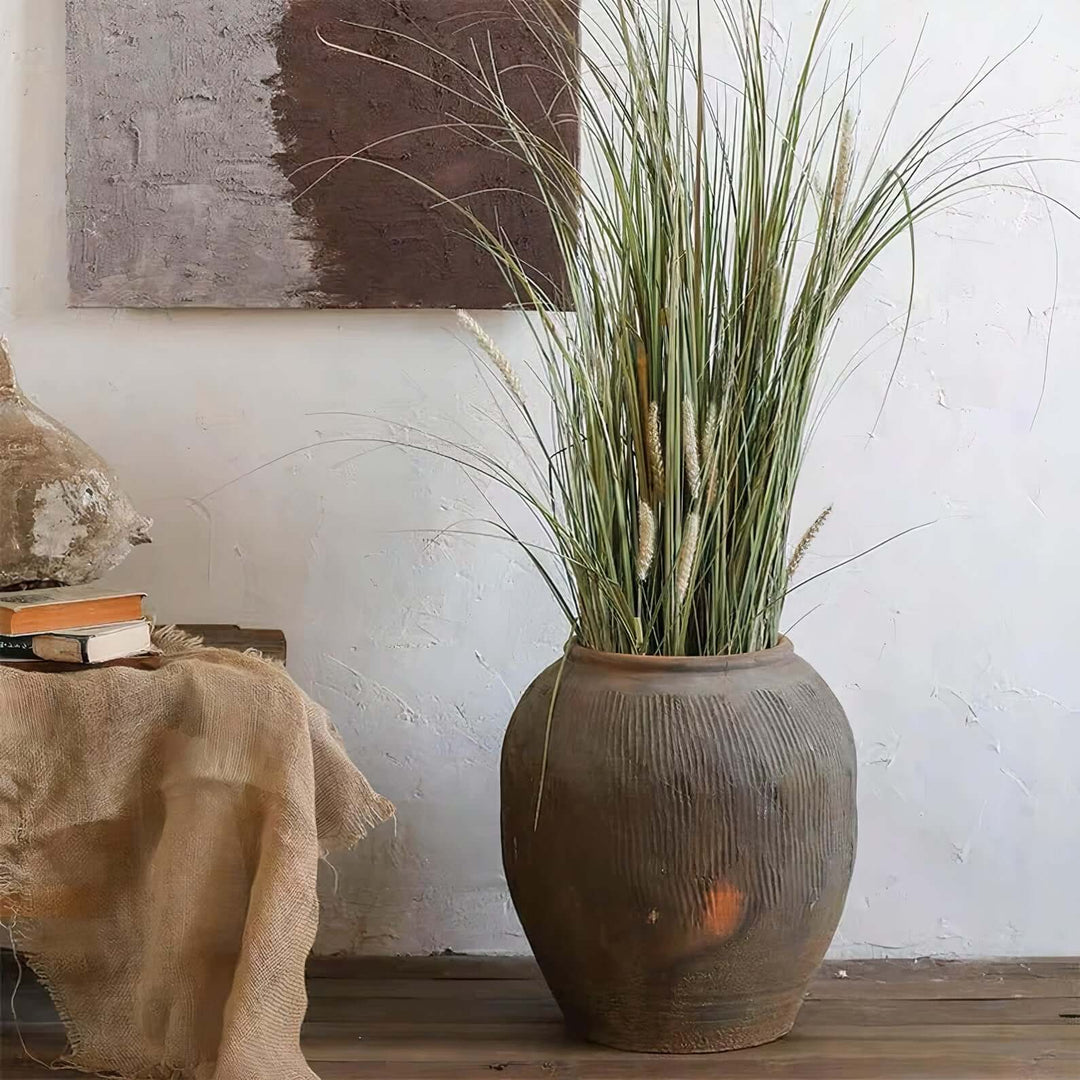 Flower Vases - Ceramic Vase featuring a large decorative ceramic vase with dried flowers in a rustic interior setting.