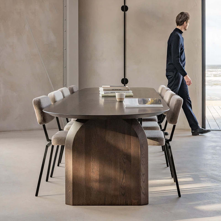 Vintage Wood Dining Table - Dark Wood Dining Table with chic curved legs and stylish chairs in a refined dining space.
