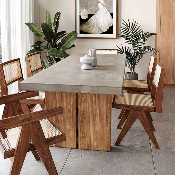 Vintage Wood Dining Table - Luxury & Sophisticated with a concrete top and stylish wooden chairs in a modern dining setting.