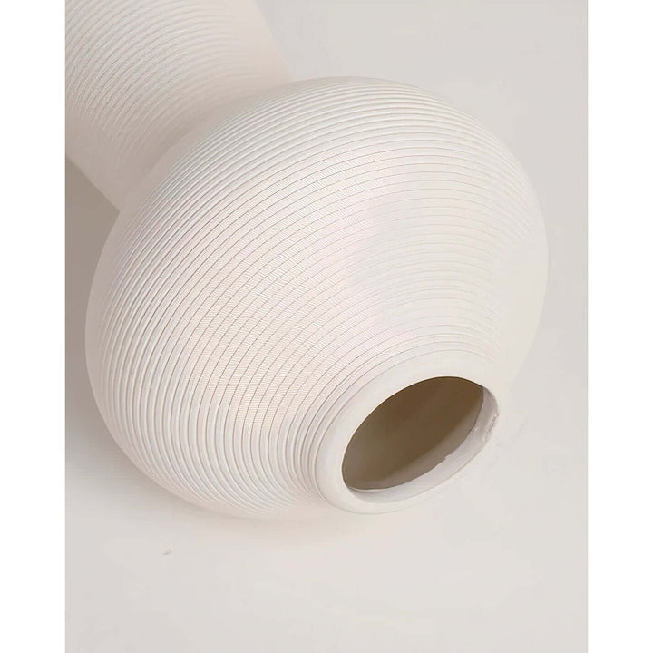 Flower Vase - White Vase featuring a smooth ceramic design with a rounded top and clean white finish.