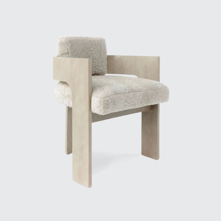 Wood Dining Chair With Cushion - Contemporary Yet Minimalistic showcasing a modern design with soft shearling upholstery.