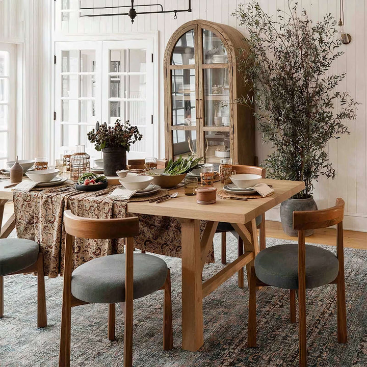 Wood Dining Chair - Natural Beauty in a cozy dining setting with a table and elegant decor.