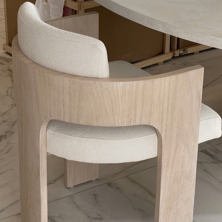 Wood Dining Chair With Cushion - Contemporary Yet Minimalistic showcasing a minimal design with soft shearling upholstery.