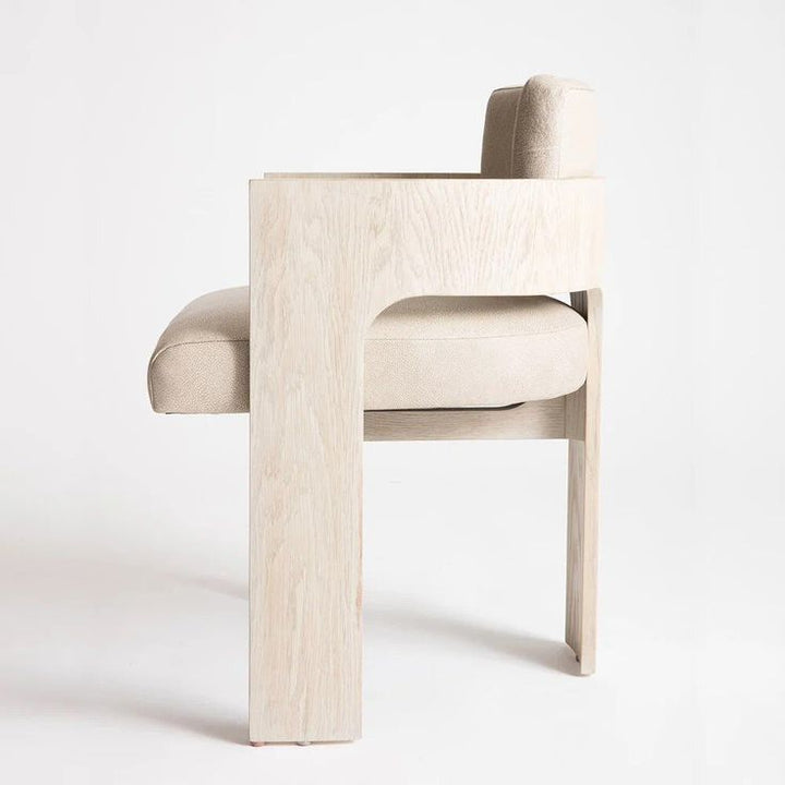 Wood Dining Chair With Cushion - Contemporary Yet Minimalistic in beige shearling upholstery, showcasing modern elegance.