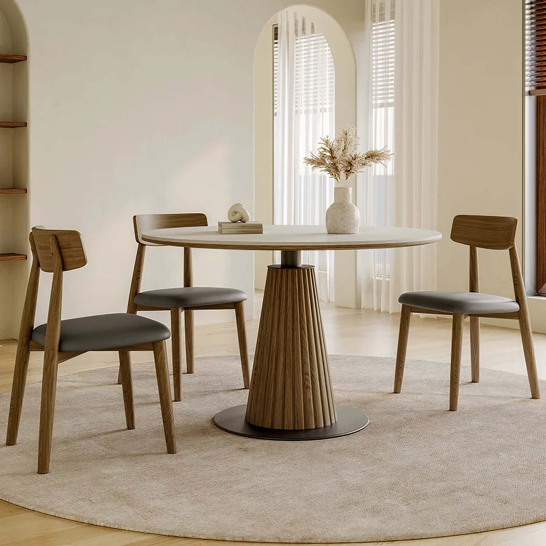 Dining And Table - Wood Dining Table featuring a modern round design with wooden chairs in a stylish interior.