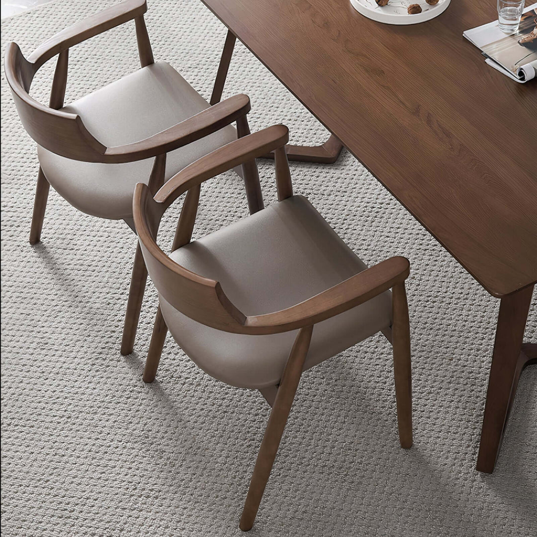 Wood And Leather Chair - For Your Dining Room pair at a wooden table, showcasing stylish design and comfort.